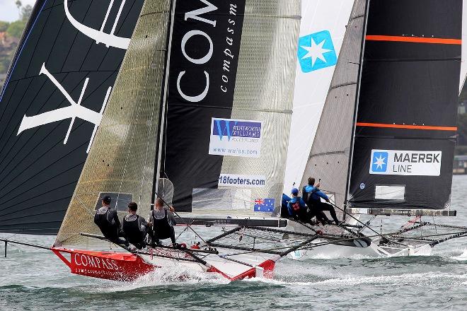 Compassmarkets struggles to get over the top of Maersk Line from New Zealand - JJ Giltinan 18ft Skiff Championship © Frank Quealey /Australian 18 Footers League http://www.18footers.com.au